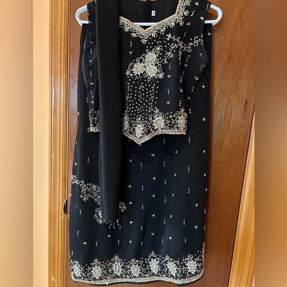 Beautiful black lehenga with sequins and embroidery.